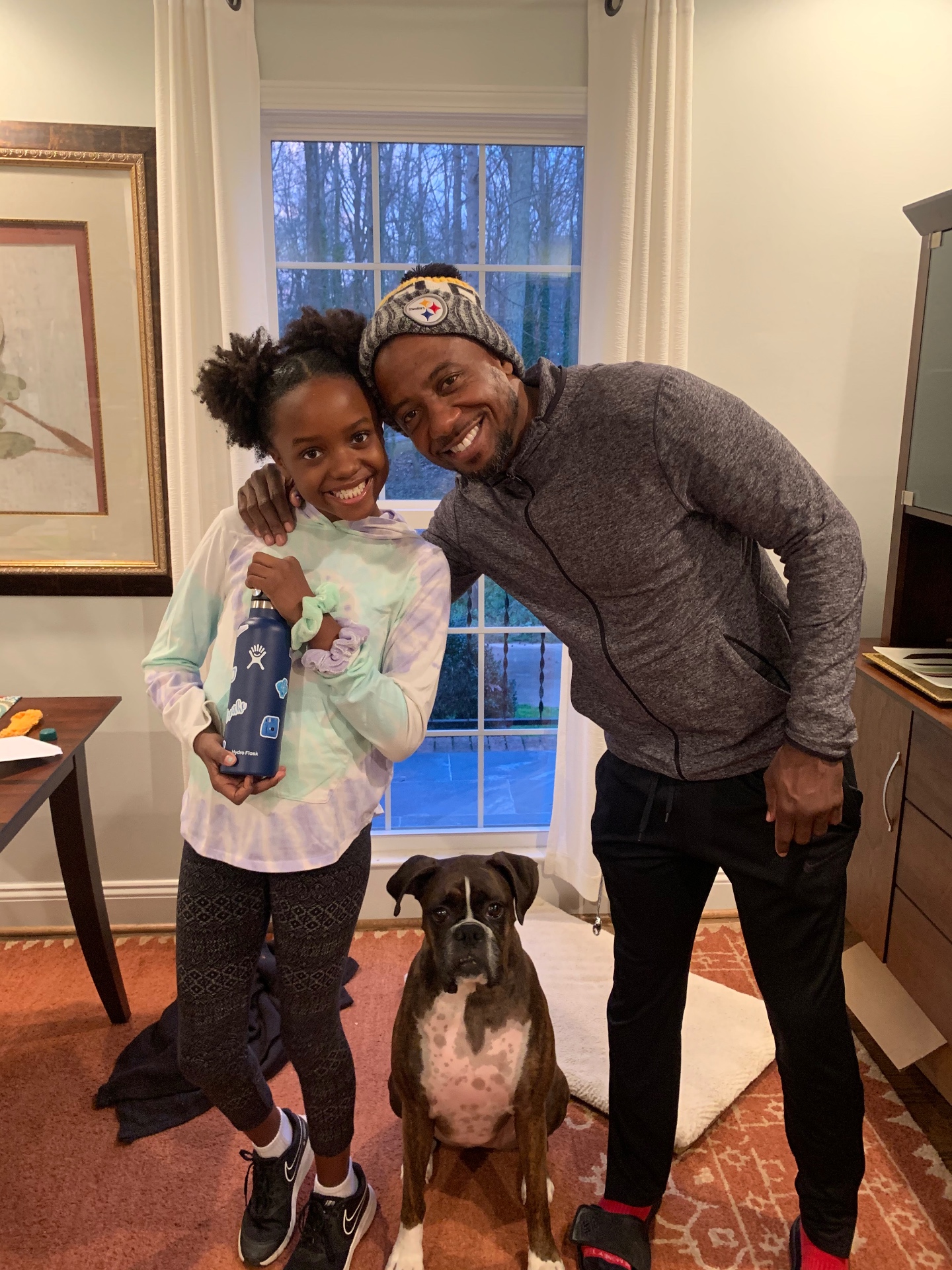 Terry and Anabelle Hammons at home with their dog